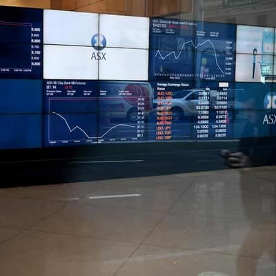 Shares rally, Aussie dollar rises on dovish Fed pivot