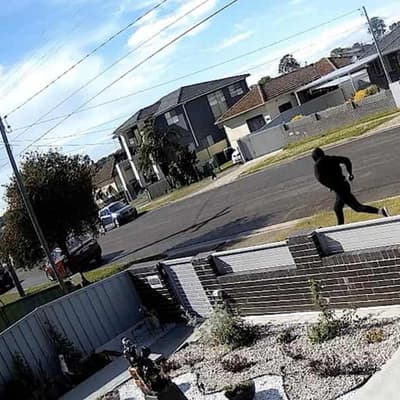 Police hunt 'barbaric, brazen' killer of father and son