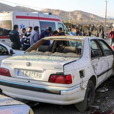 Blasts kill nearly 100 at ceremony for Iran commander