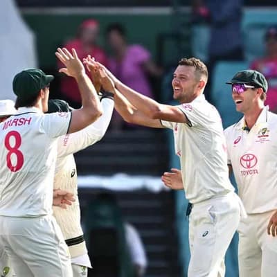 Hazlewood triple-wicket maiden puts Australia on a roll