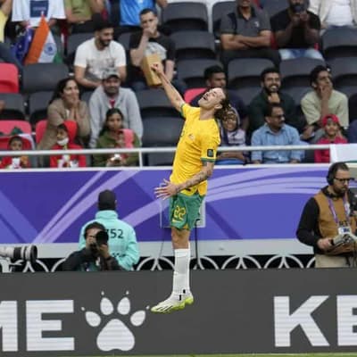 Underwhelming Socceroos grind past India in Asian Cup