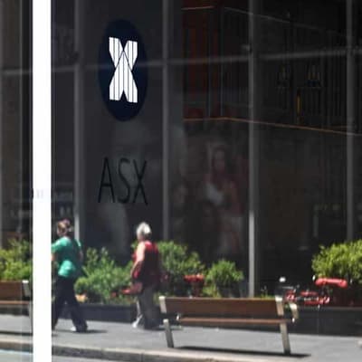 Australian shares flat as uranium soars, lithium dips