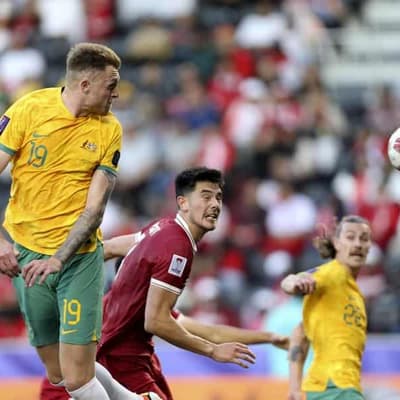 Socceroos reach Asian Cup quarters, finding feet