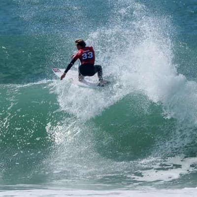 Ewing rides Atlantic waves into last eight in Portugal