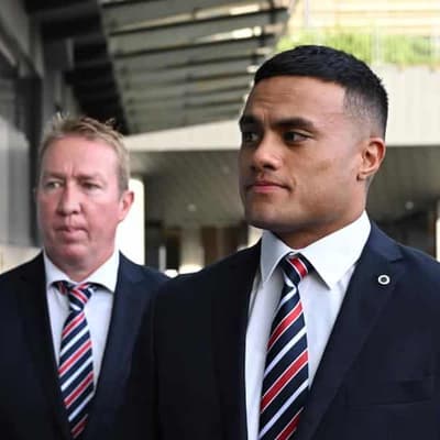 Leniu 'not a racist', declares Roosters coach Robinson