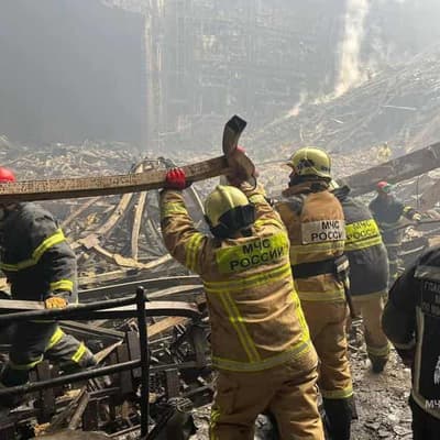 Russia arrests suspected gunmen as concert toll rises