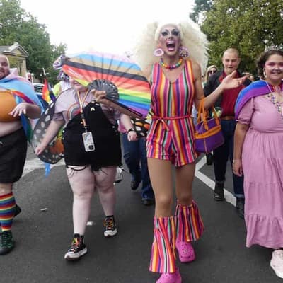 Orange becomes part of the rainbow in pride celebration