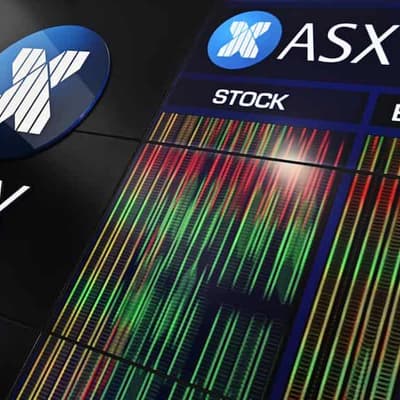 Australian shares hit record high but close lower