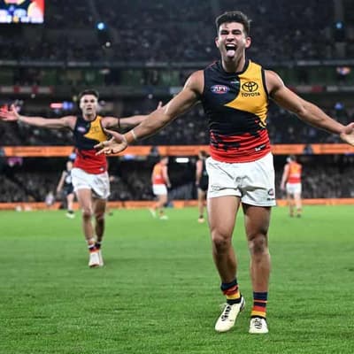Crows rally to beat Blues for first win of the season