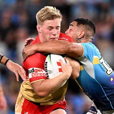 Plath re-signs with Dolphins after perfect season start