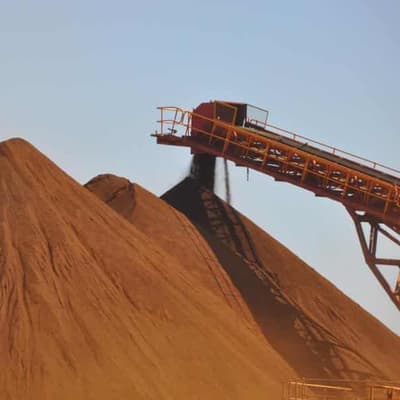 Global body warns Australia on interest rates, NDIS