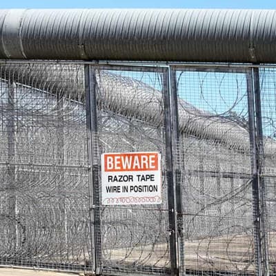 Prisoners locked in cells while guards strike over pay