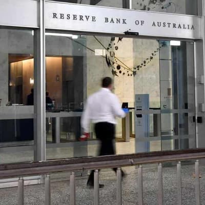 Australian shares finish lower as RBA decides on rates