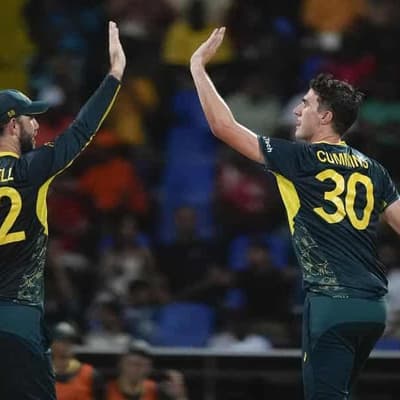 Cummins hat-trick takes Aussies to brink of Cup semis