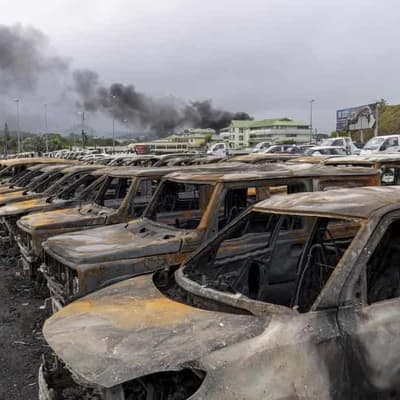 Police cars torched in fresh New Caledonia protests