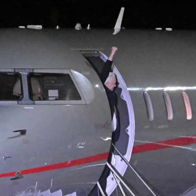 Assange lands in Australia after US guilty plea