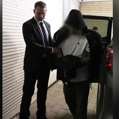 Second man charged over woman's abduction and ransom