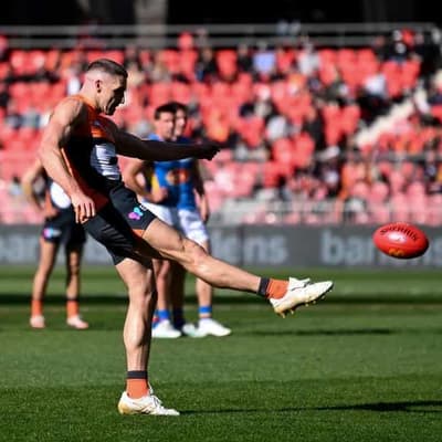 Giants crush road strugglers Suns in AFL finals push