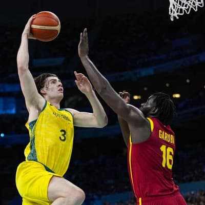 Boomers overcome Spain in fiery Games foul-fest