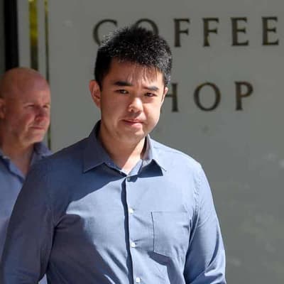 Doctor charged over lewd patient photos set for custody