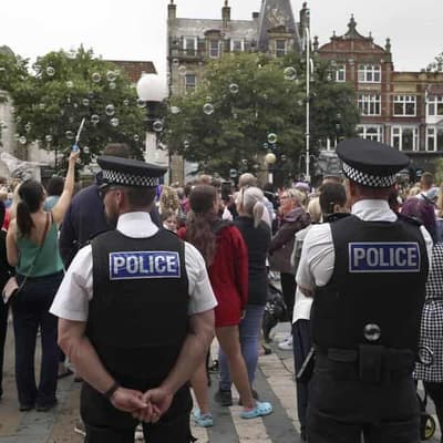 Britain adds more prison places as riots continue