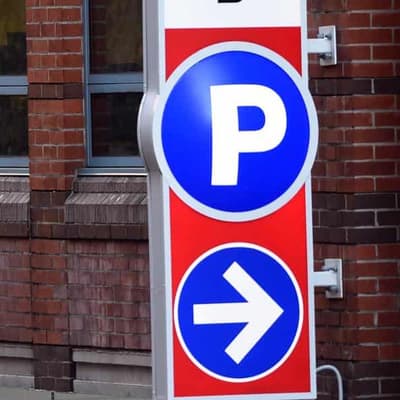 Digital parking fines soar as wheels turn to curb rise