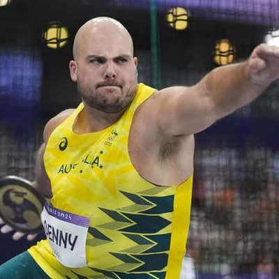 Denny's home circle visions spur historic discus medal