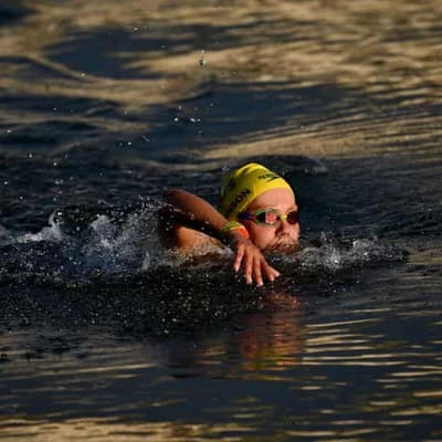 Johnson celebrates in-Seine silver - with antibiotics