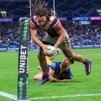 Young bags hat-trick as Roosters belt Eels in the wet