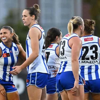 AFLW premiership favourites Kangaroos smash Port in wet