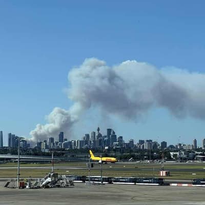 Firefighters to backburn overnight as fire threat eases