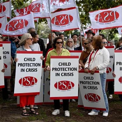 Pay boost for workers to fix 'broken' child protection