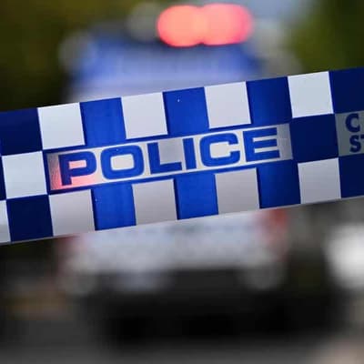 Man under guard in hospital after shots fired at police