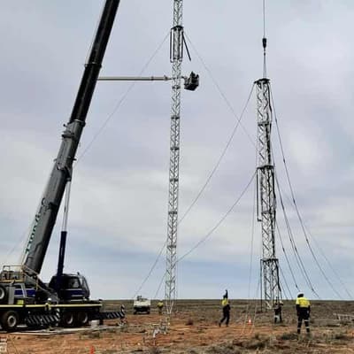 Workers build Broken Hill towers in power outage fix
