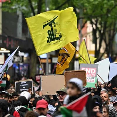 Fourteen people investigated for terror symbol displays