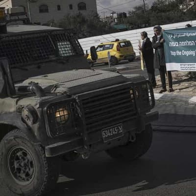 Medics report 19 dead as Israeli tanks leave Gaza camp