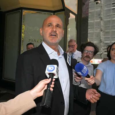 Restaurateur who held up anti-Israel sign 'no neo-Nazi'