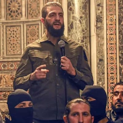 Syrian rebel chief vows to dissolve Assad regime forces