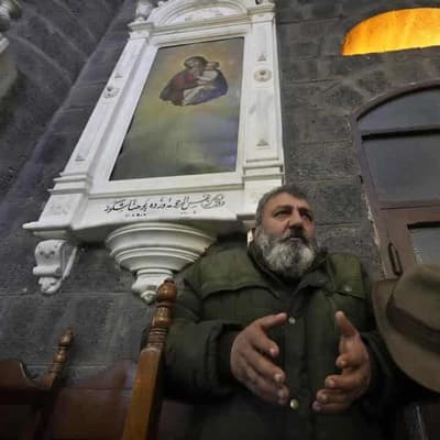 Christians attend services, schools reopen in Syria