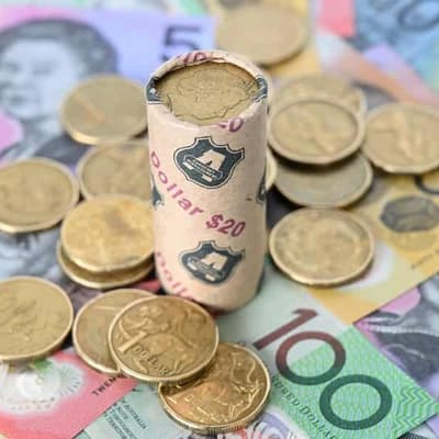 Australian dollar firms but remains vulnerable
