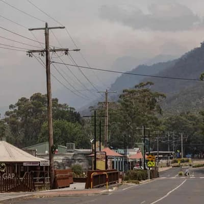 Bushfire under control, but people told not to return