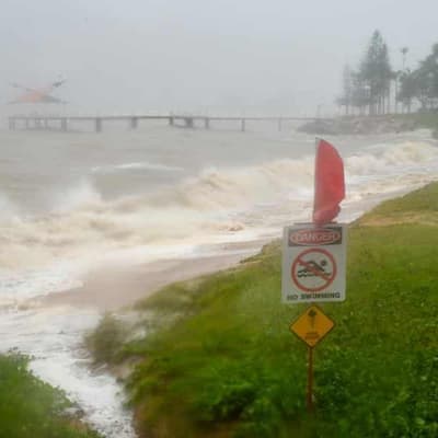 Woman dies in raging floodwaters as deluge continues