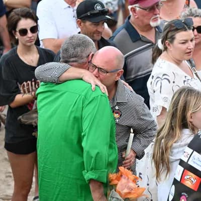 Stunned community honours treasured teen shark victim