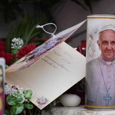 Pope had 'peaceful' night despite pneumonia diagnosis