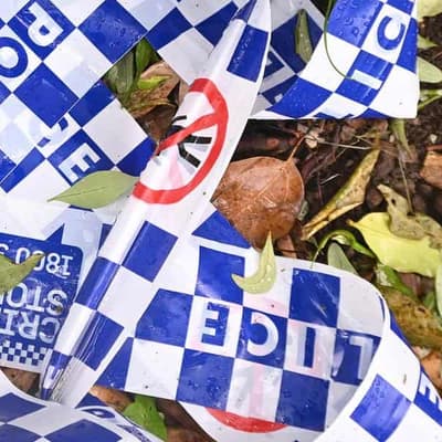 Man charged with murder after woman shot on street