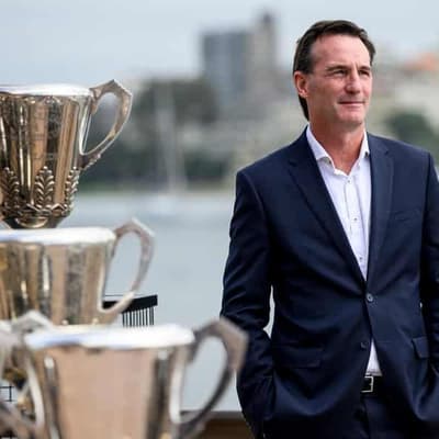 AFL looks to kick off season as cyclone watch continues