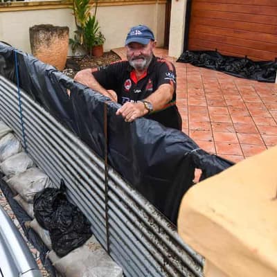 Sandbags to iron fences: millions braces for cyclone