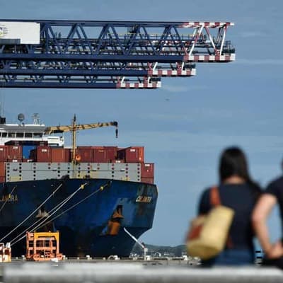 Australian shares slide again as trade war ramps up