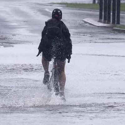 Anxious 'wait and see' as cyclone and floods threaten