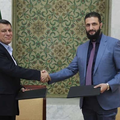 Syria's president signs deal with Kurdish-led SDF